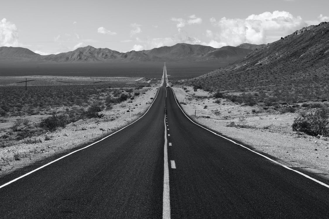 long empty highway in cold climate